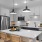 kitchen with an island, modern appliances and spacious counter-space