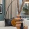 Detail of a model living room at our apartments for rent in Raleigh, NC, featuring white couches and modern decor.