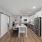 a kitchen with a prep island