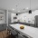a kitchen with a prep island