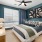 bedroom with a large window and modern decor